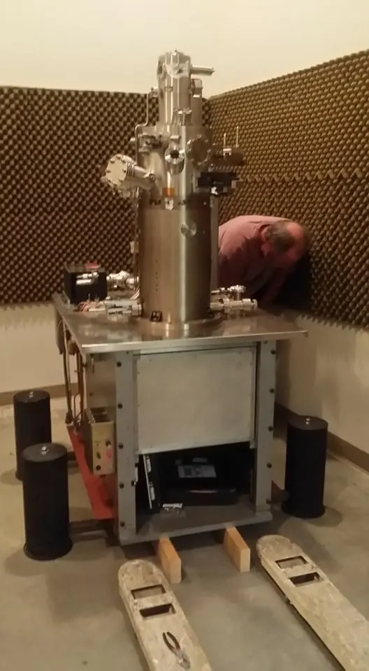 Electron microscope column on its stand during service